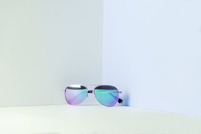Close-up of sunglasses on white background