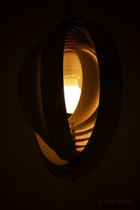 Low angle view of illuminated light bulb