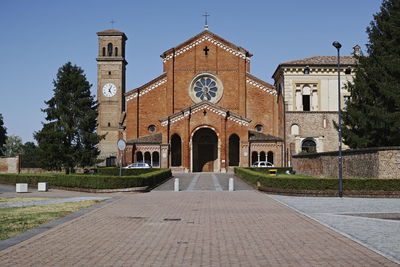 Facade of historic building against sky