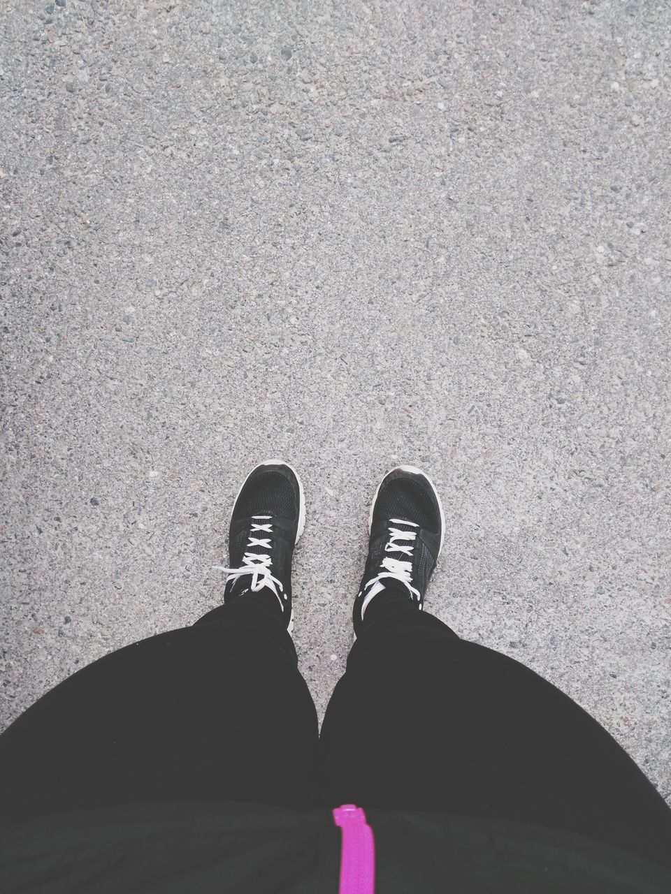 low section, person, shoe, personal perspective, standing, lifestyles, street, footwear, men, leisure activity, high angle view, human foot, road, unrecognizable person, outdoors, day