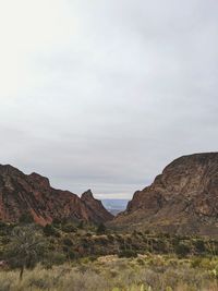 Scenic view of rocky mountains against sky. the window in big bend national park during winter.