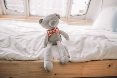 Stuffed toy on bed at home