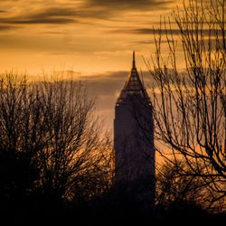 Silhouette of building during sunset