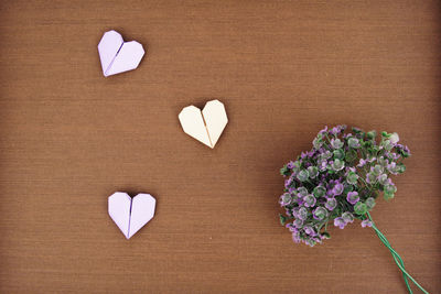 Directly above shot of heart shape on white table