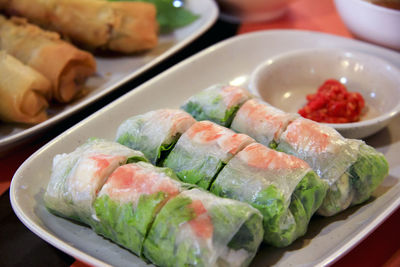 Close-up of sushi in plate on table