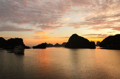 Scenic view of sea against sky at sunset