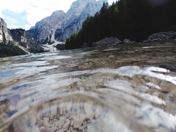 Surface level of water flowing over rocks