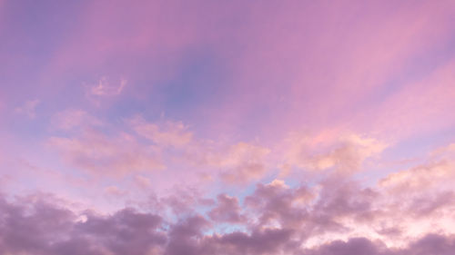 Low angle view of clouds in sky during sunset