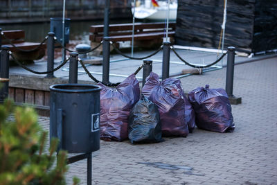 Low section of clothes hanging on footpath by building