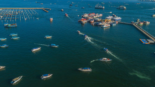 High angle view of sailboats in sea