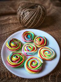 High angle view of multi colored candies on table