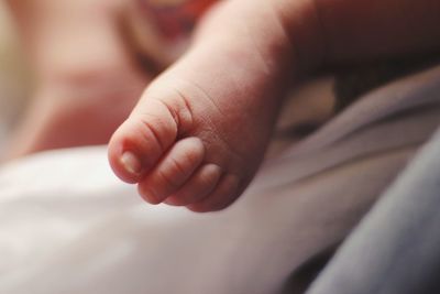 Close-up of baby girl foot