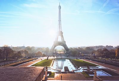 Eiffel tower against sky during sunny day