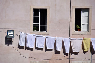 Clothes drying against window