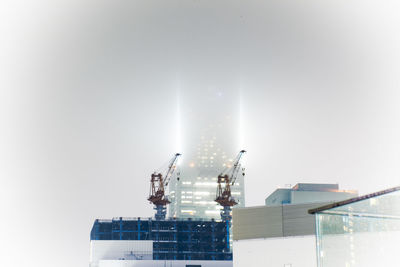 Close-up of crane against clear sky