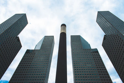 Low angle view of modern buildings against sky