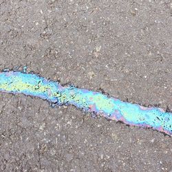 High angle view of multi colored umbrella on street