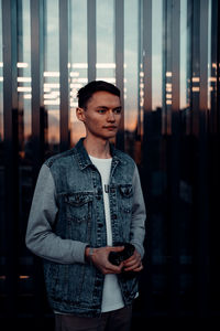 Young man looking at camera