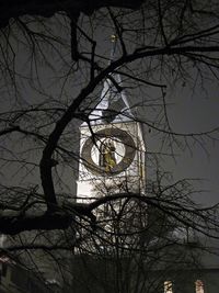 Low angle view of bare tree against sky