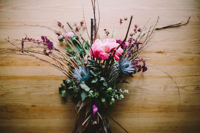 Close-up of flower vase on table at home