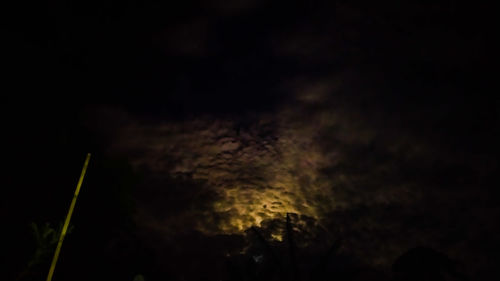 Low angle view of clouds in sky at night