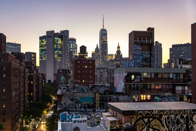 Modern buildings in city against sky