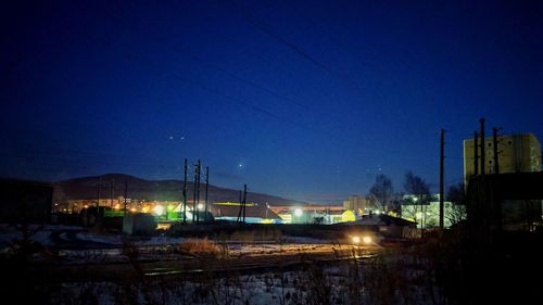 Illuminated blue sky at night