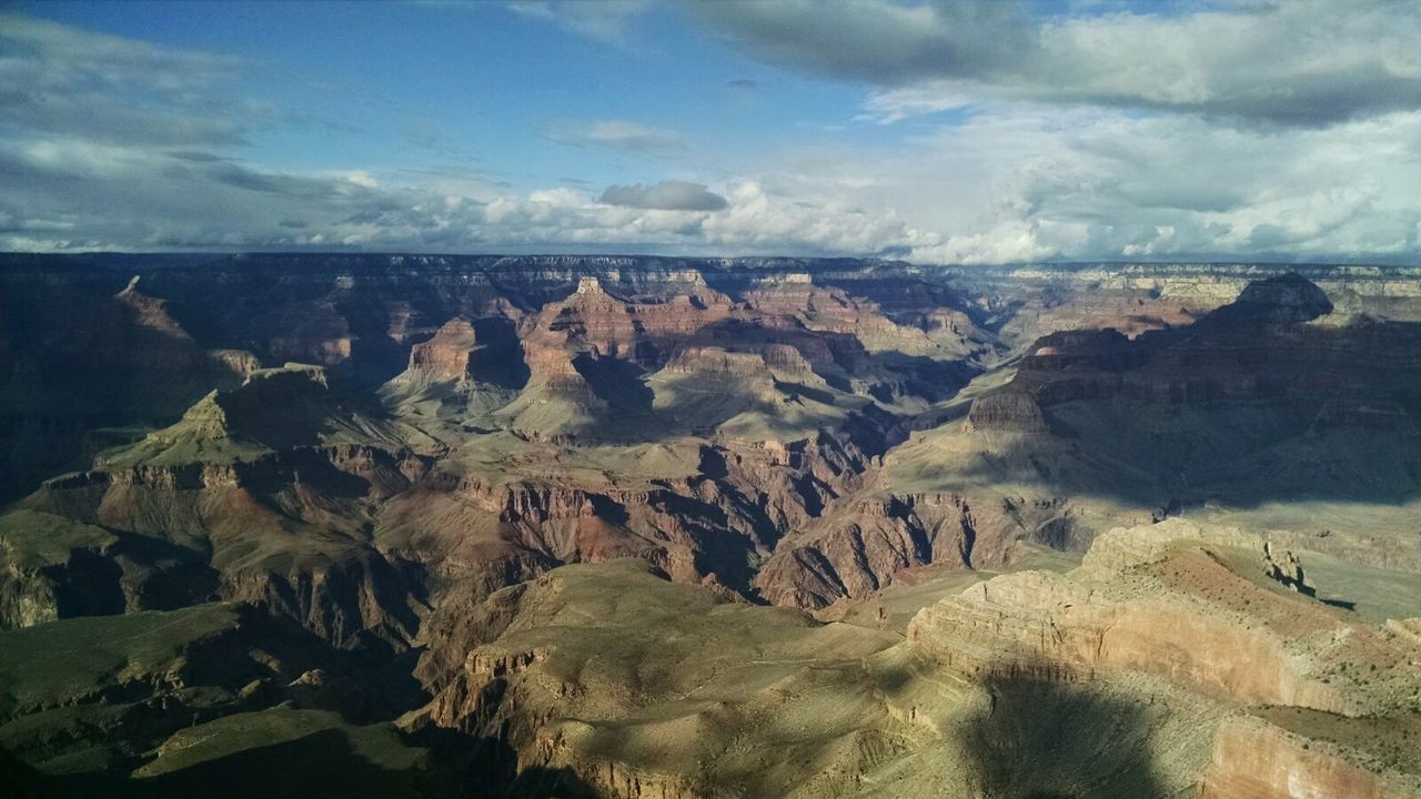 PANORAMIC VIEW OF ROCK FORMATIONS AGAINST SKY