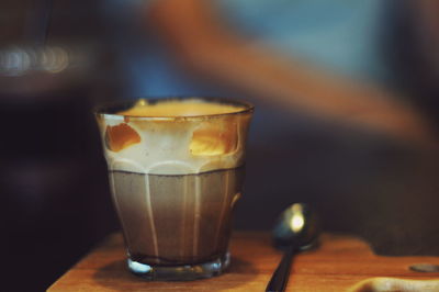 Close-up of coffee cup on table