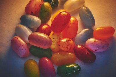 Directly above shot of multi colored candies in plate