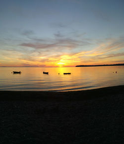 Scenic view of sunset over sea