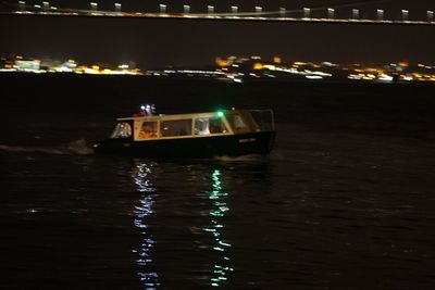 Reflection of illuminated buildings in water