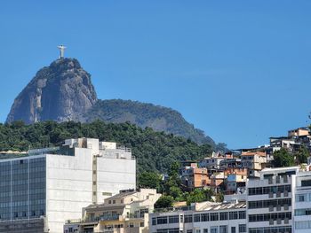 Buildings in city against clear blue sky,  rio de janeiro, brazil