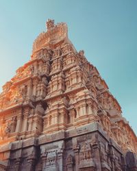 Exterior of historic temple against clear blue sky