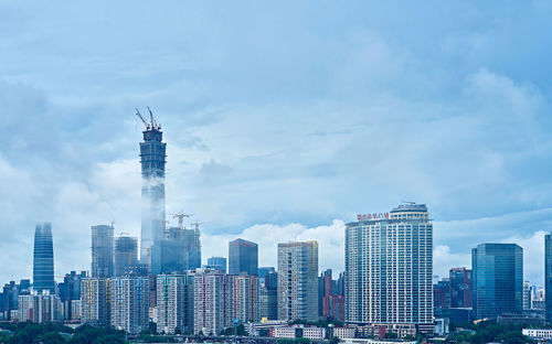 Modern cityscape against sky