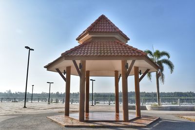 Built structure on beach against sky