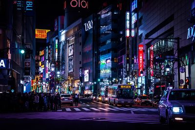 Illuminated buildings in city at night