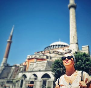 Woman outside mosque in city