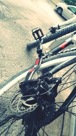 High angle view of bicycle parked on road