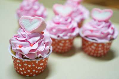 Close-up of cupcakes on table