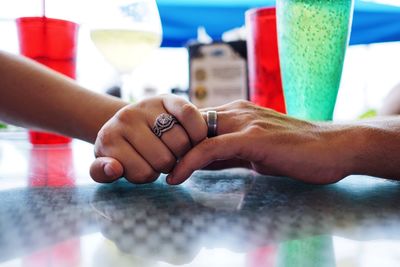 Close-up of hand holding ice cream