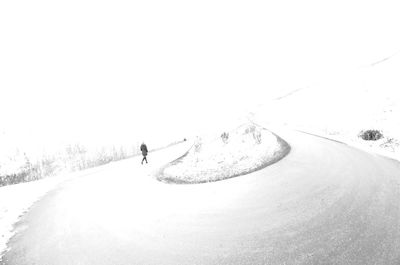 Man on snow covered landscape