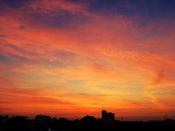 Scenic view of dramatic sky during sunset