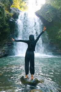 Play and enjoy the waterfall