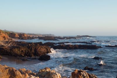 Scenic view of sea against clear sky