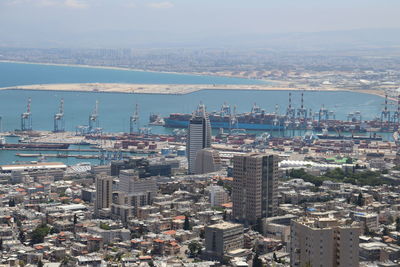 High angle view of buildings in city against sky