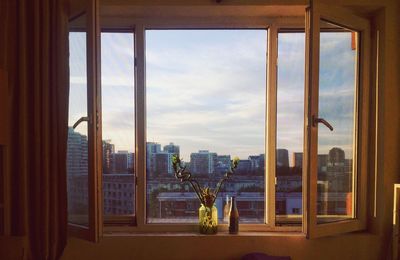 Cityscape seen through window at home