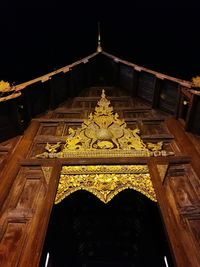 Low angle view of temple against sky at night