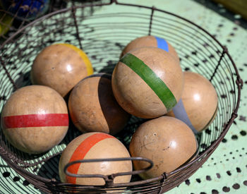 High angle view of fruits in basket on table