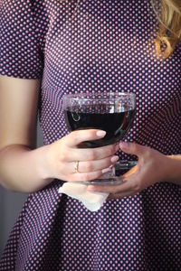 Close-up of a hand holding drink